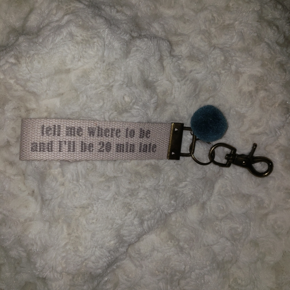 Late Altar'd State key chain strap and fuzz ball